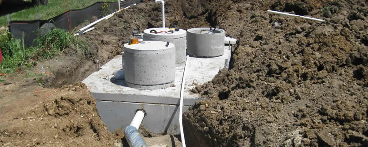 Septic system repair and installation site with tank access ports in Harrisburg, PA